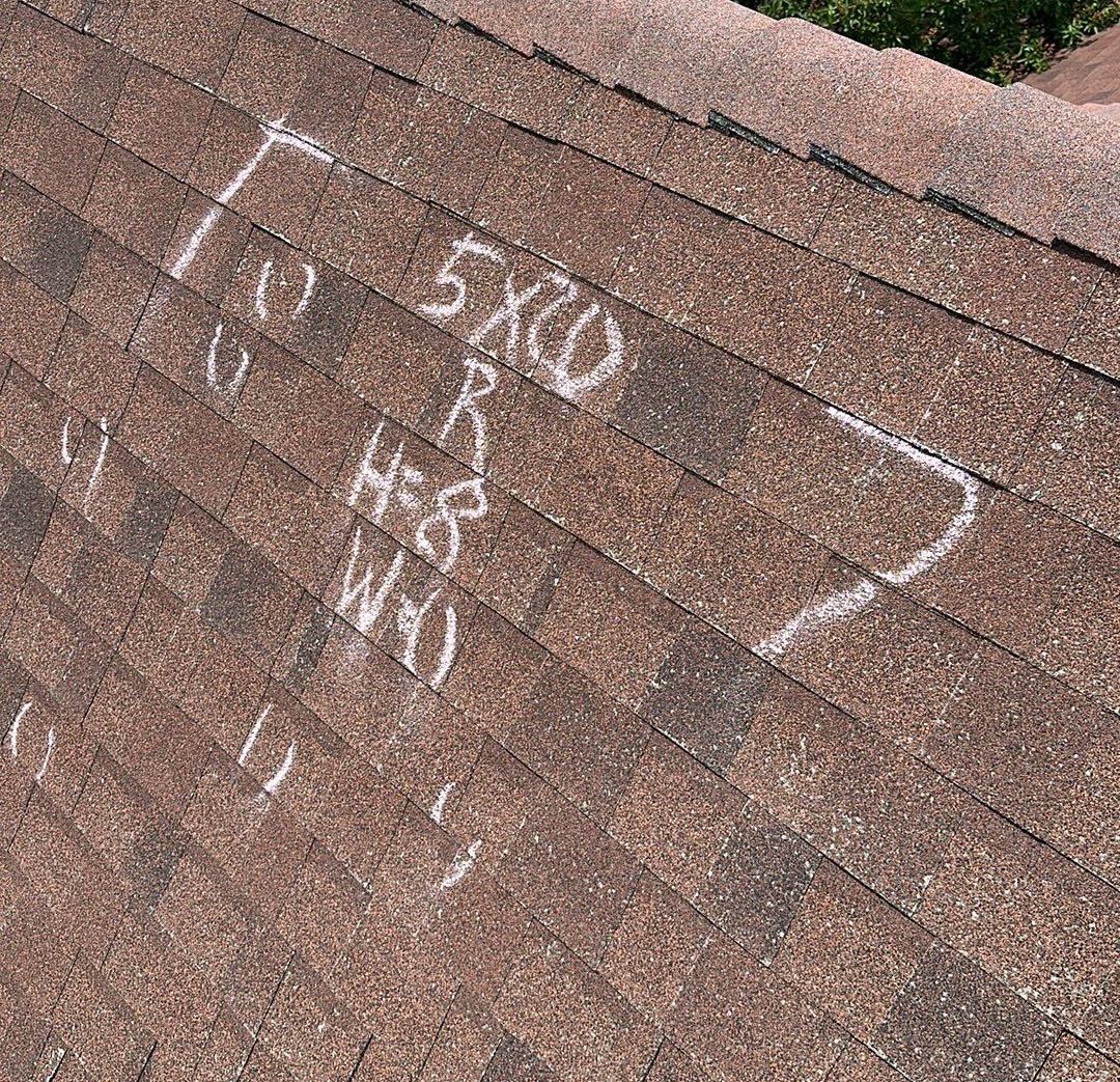 Image of a roof inspection by MD roofing and construction performed in Frisco Texas